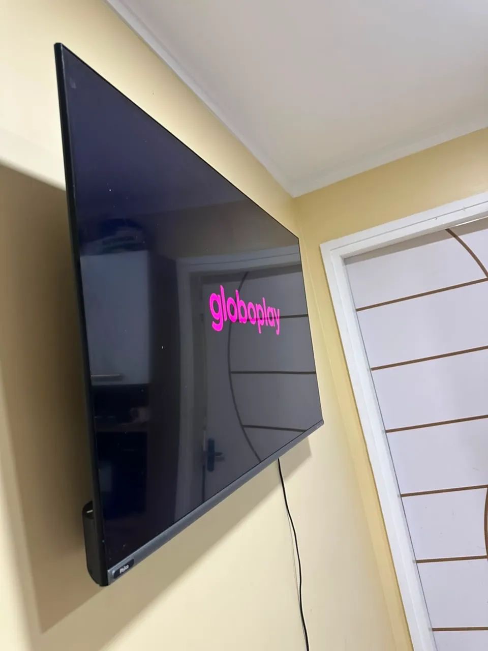 Smart tv 55 polegadas com controle e pezinho  - Foto 3
