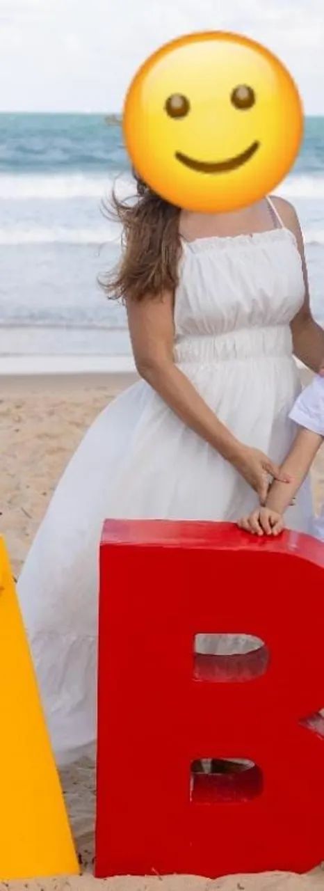 Vestido branco ? longo.