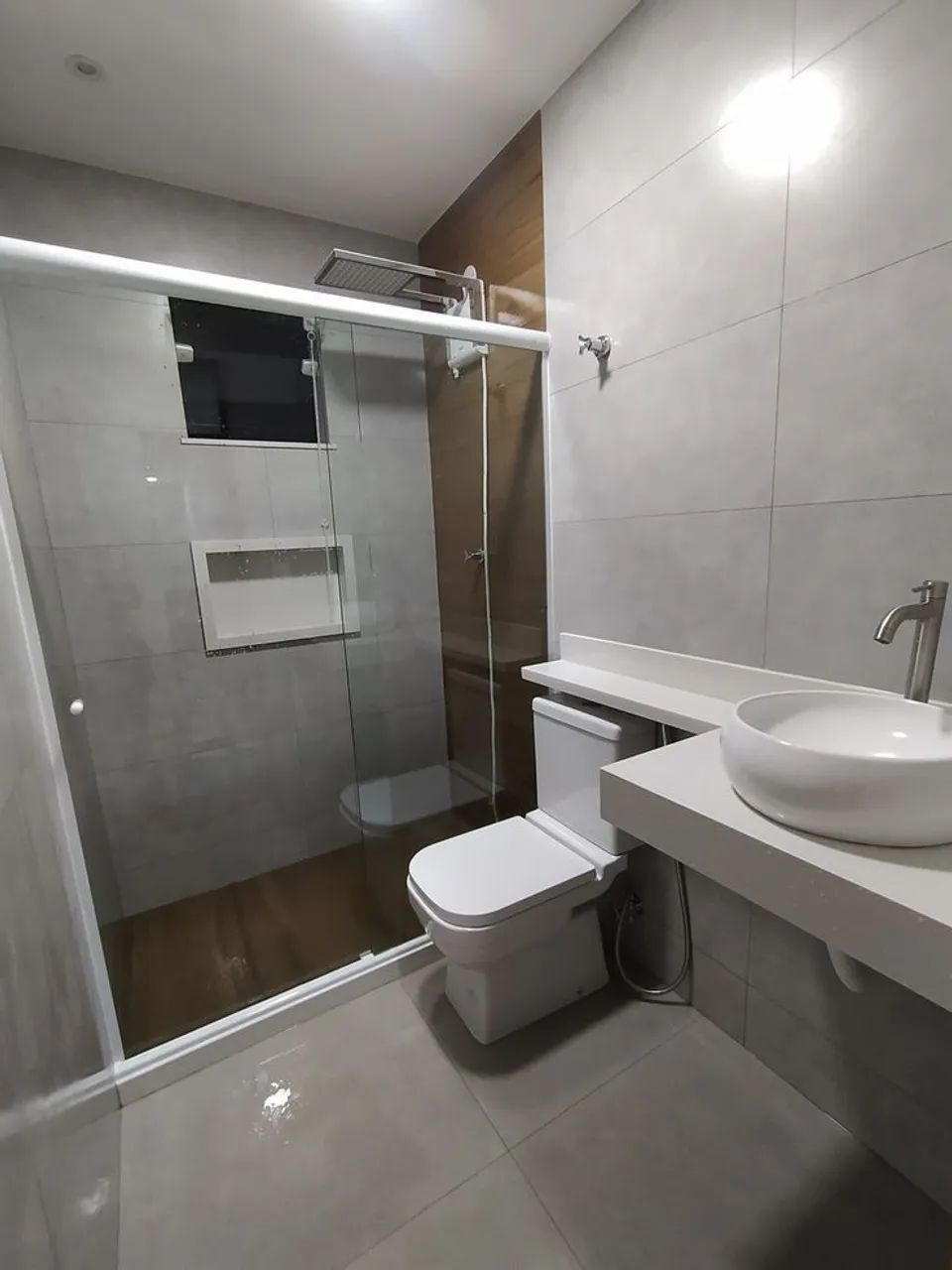 Glass shower enclosure