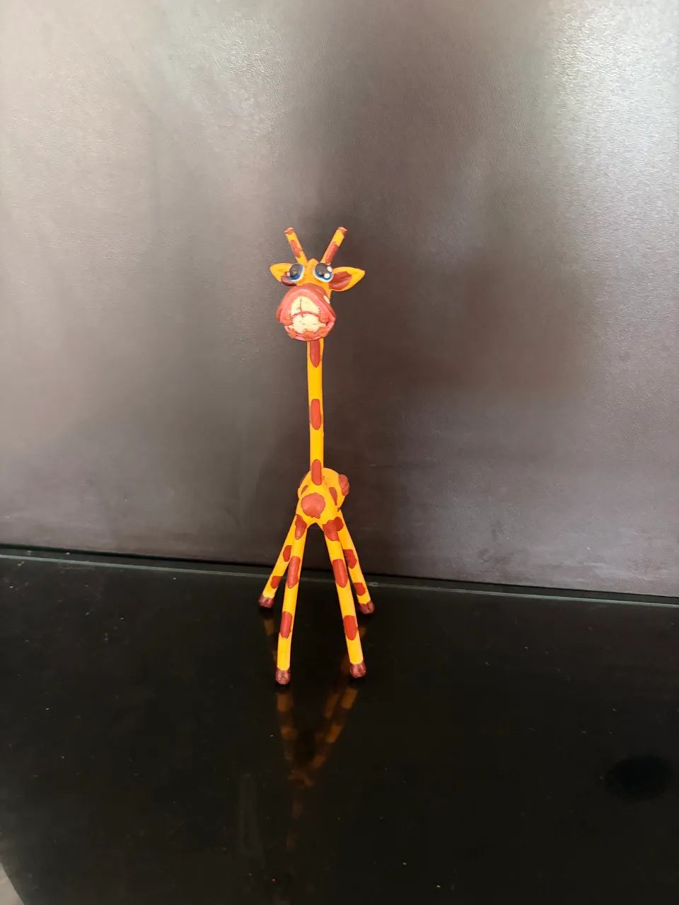 Girafa em madeira