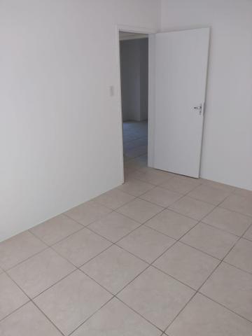 Apartamento 2 quartos térreo para alugar - ótima localização - Foto 4