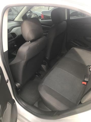 Onix Joy 1.0 completo 2018/2018 pouco rodado. - Foto 6