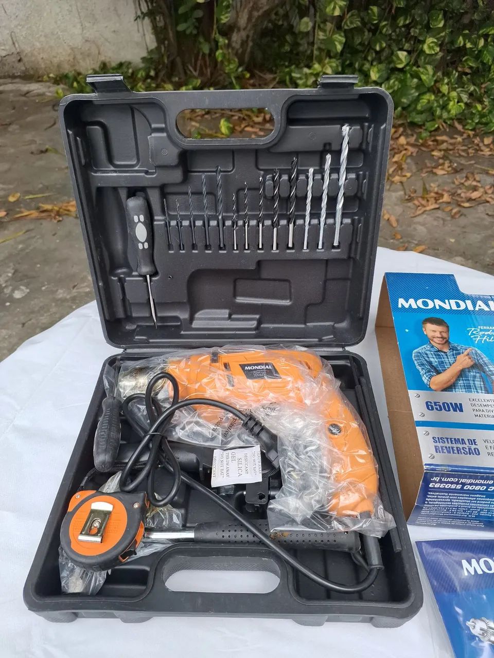 Furadeira de impacto Mondial 650w, 127v, com maleta e 19 acessórios, na embalagem.  - Foto 3
