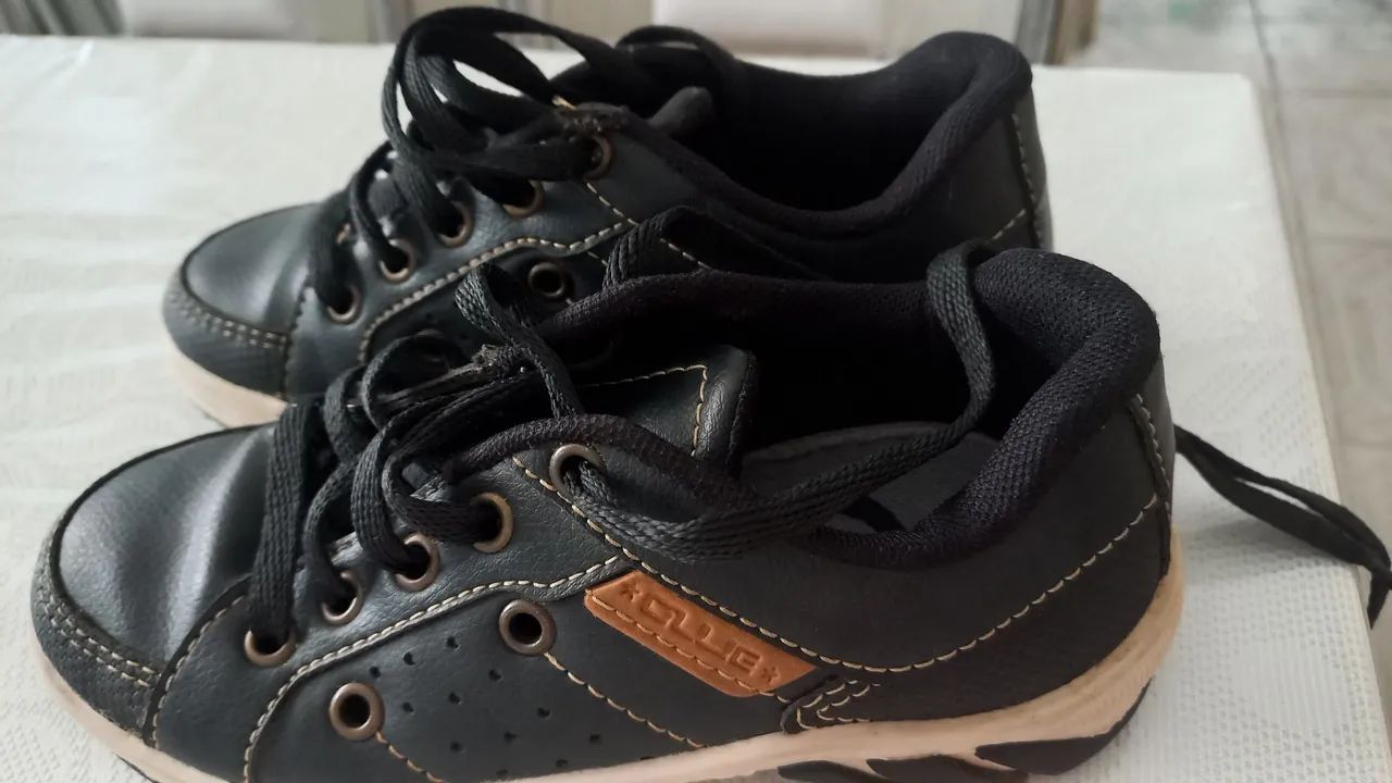 Um tênis  preto  tamanho 29 usado   - Foto 5
