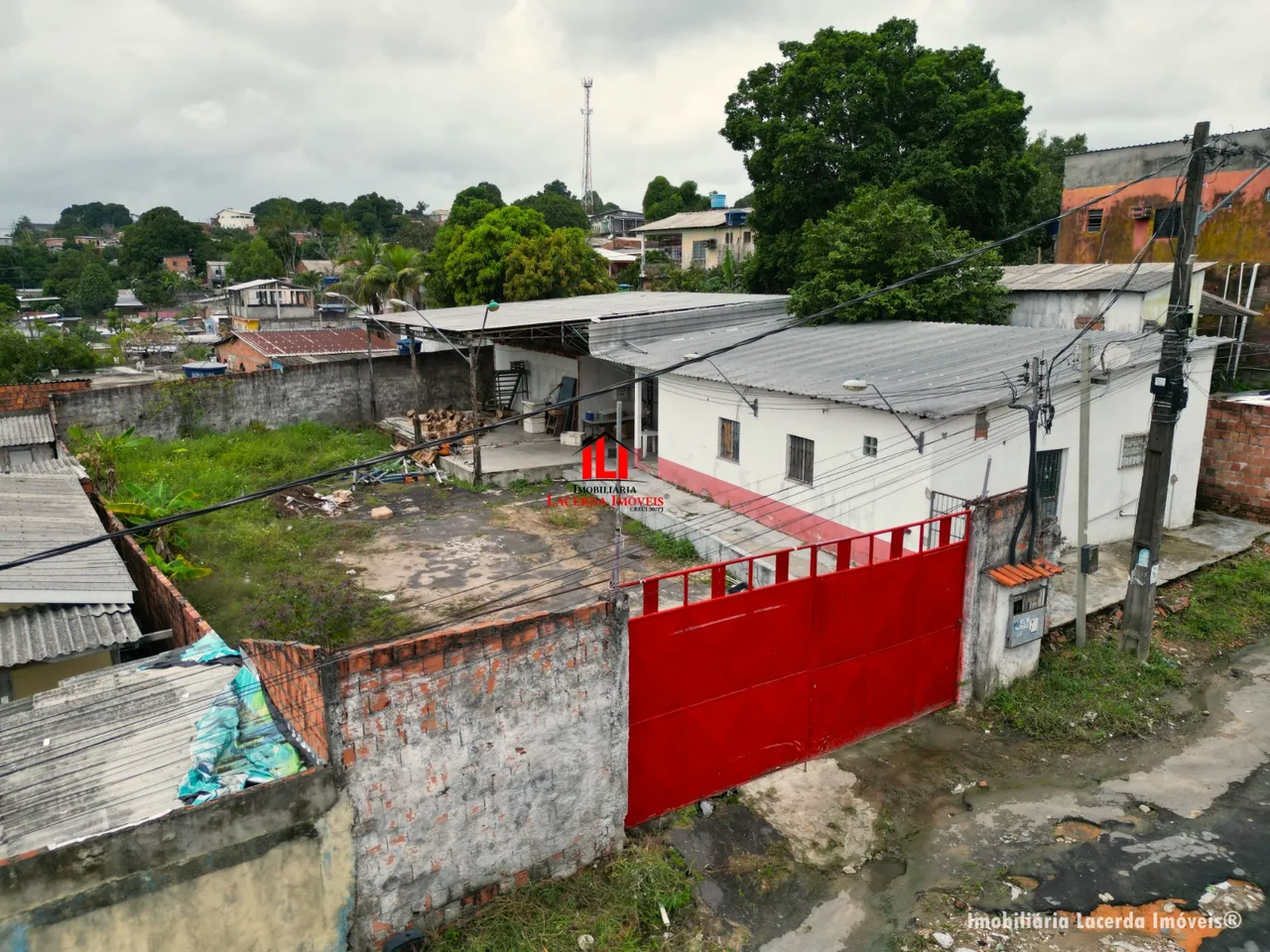 Terreno/Casa no bairro Colônia Terra Nova/ 650m² (Galpão) de 153m² e uma casa com 83,00m²