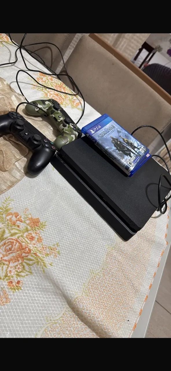 Vendo ps4 1t com 2 controles