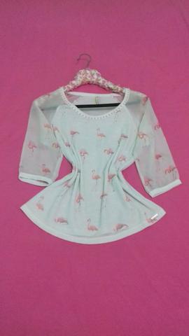 Blusa flamingos