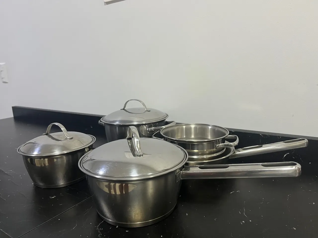Jogo de panelas Tramontina Inox fundo triplo