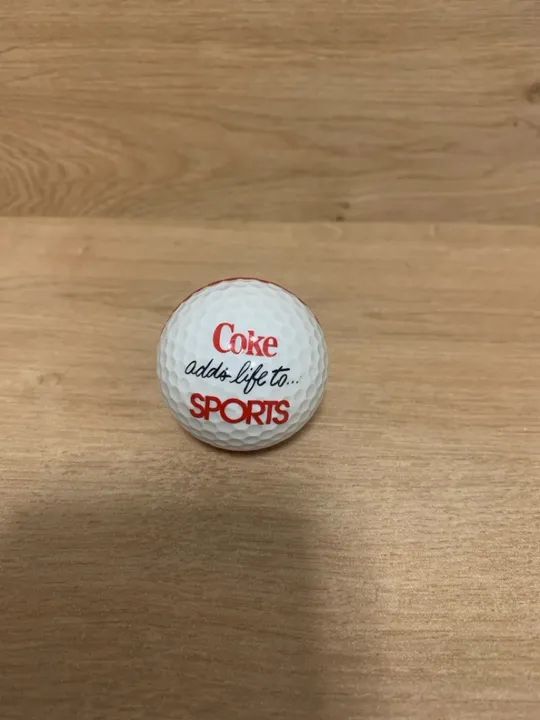 Bola de golf coca cola 