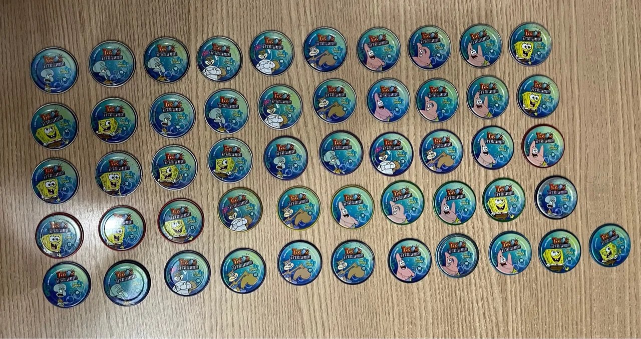 44 unidades de Tazos metálicos do Bob Esponja da Elma Chips.