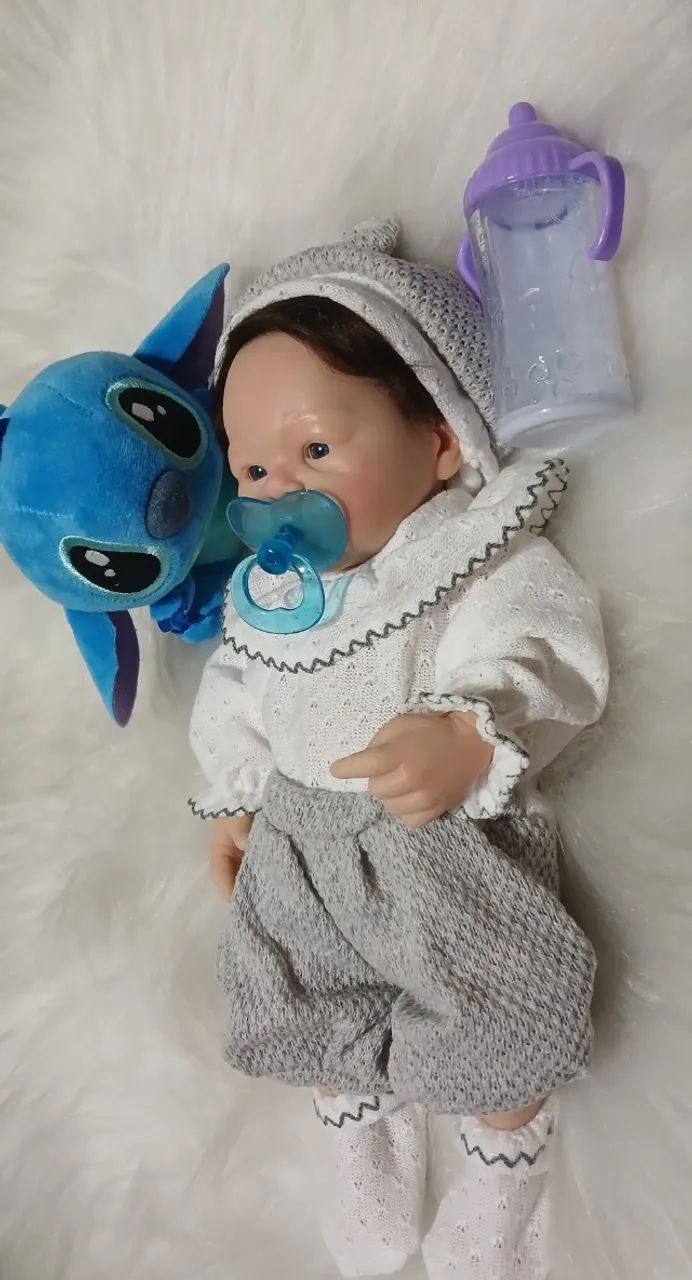 Boneca bebê reborn de silicone sólido menino  - Foto 4