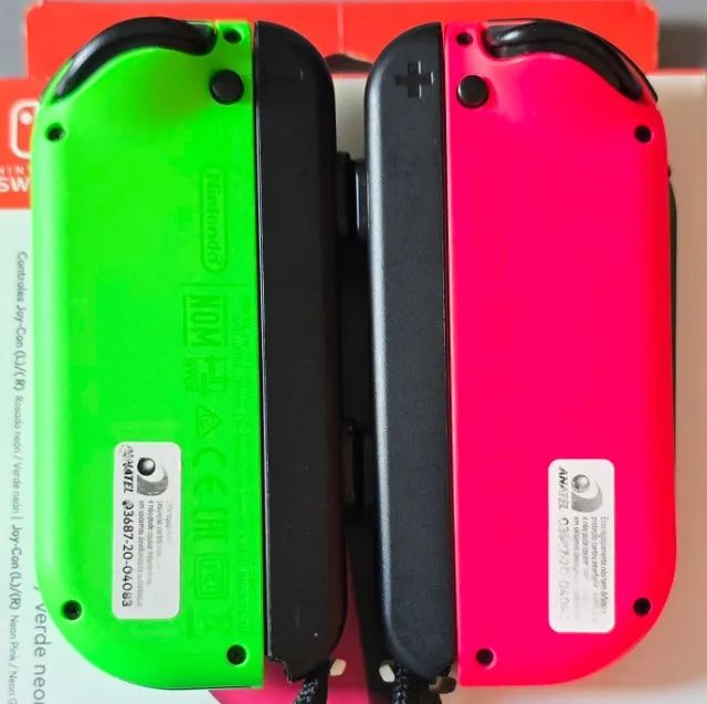 Controles Joy-Con rosa neon e verde neon Nintendo Switch - Foto 4