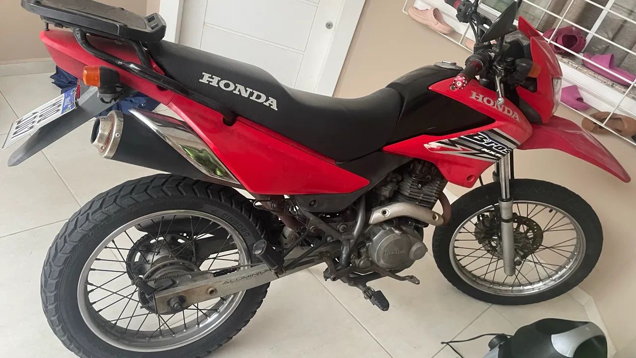 Bros 150 troco por carro