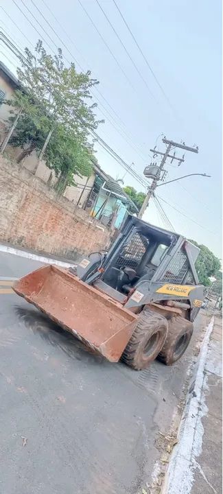 Mini carregadeira New holland 2009