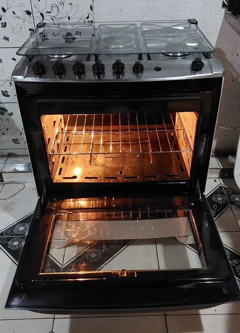 Excelente fogão Electrolux top automático com tripla chama automático com prateleira  - Foto 2