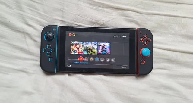 Nintendo Switch Cinza + 3 Jogos  Console de Videogame Nintendo