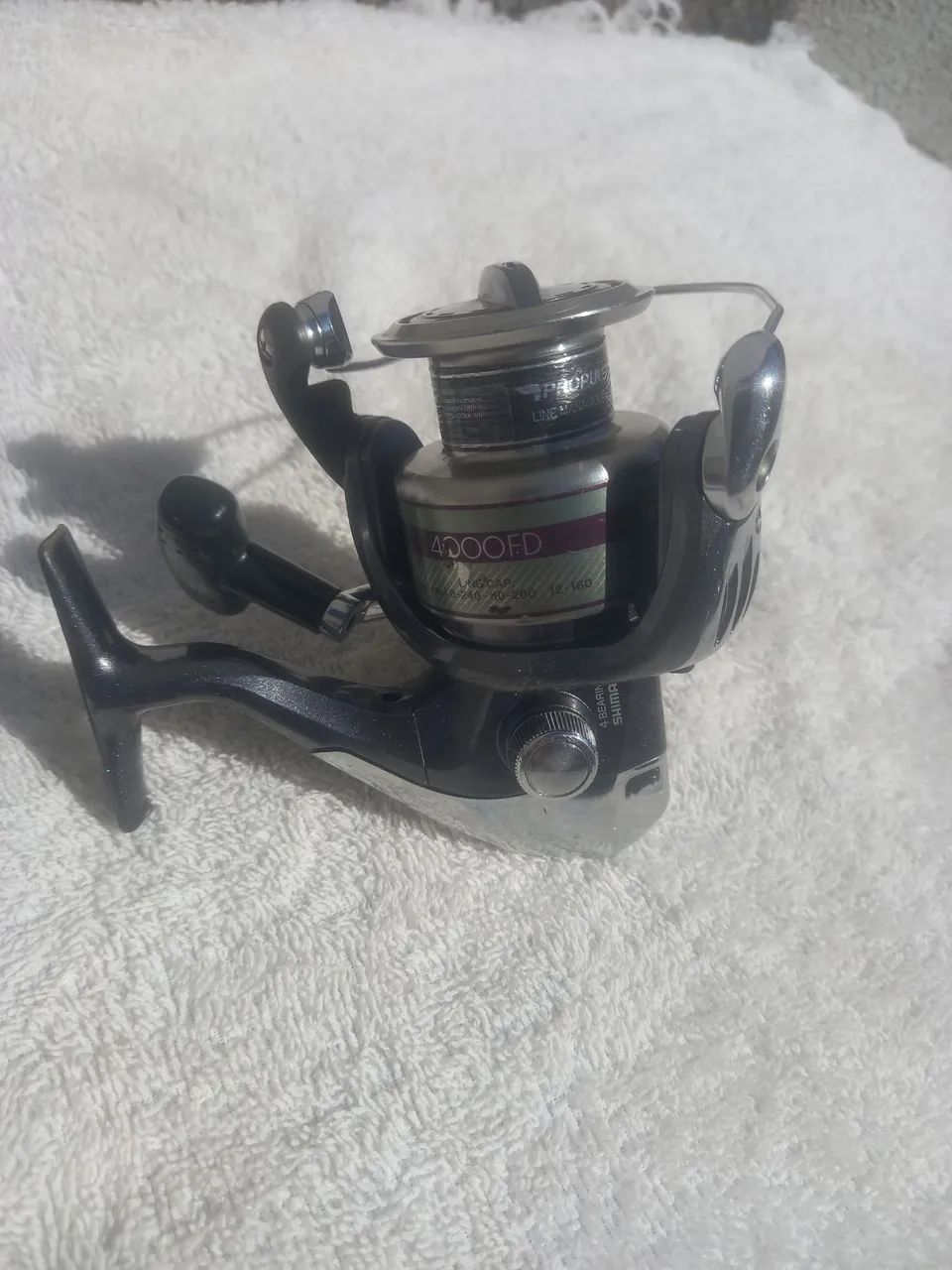 Molinete shimano sienna 4000 FD - Foto 5