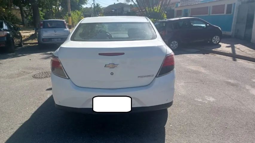 Prisma 1.4 Automático com GNV IPVA 2025 pago e vistoriado ar gelando e travas elétricas - Foto 2