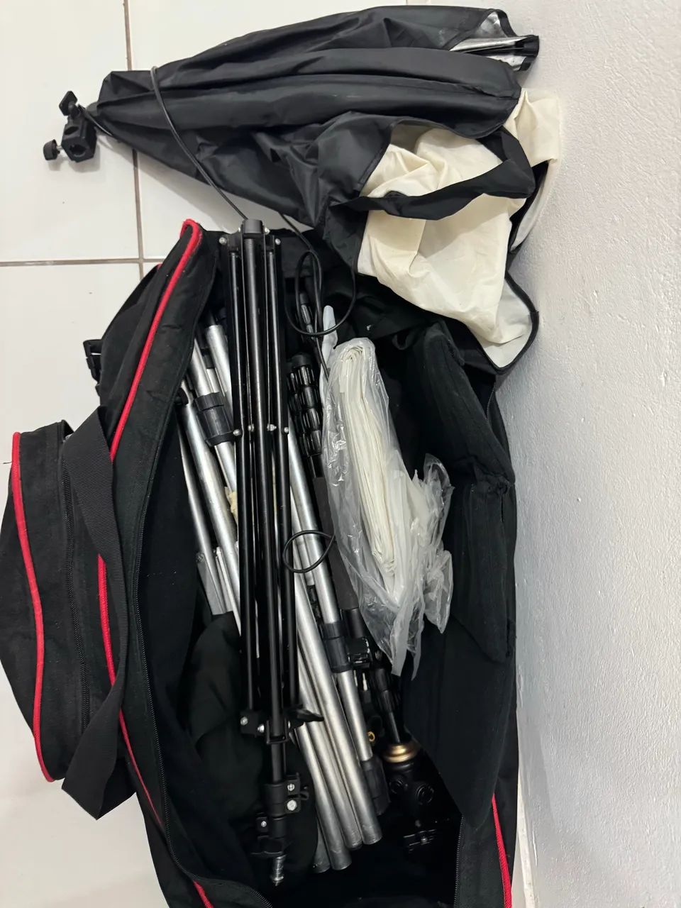 Bolsa + tripés + kit iluminação 