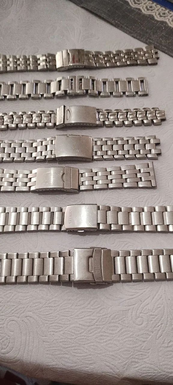 Relógio e pulseira de aço 