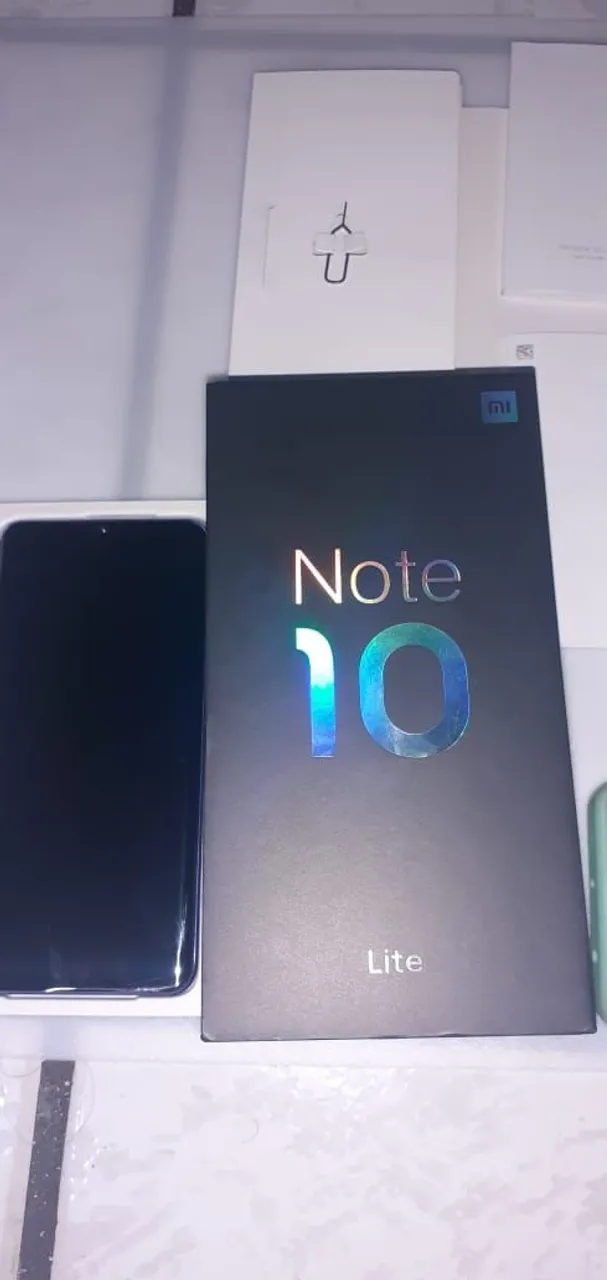 Mi note 10 lite completo com película de gel já aplicada tela curva ?