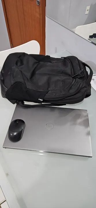 Notebook Dell com mouse e mochila