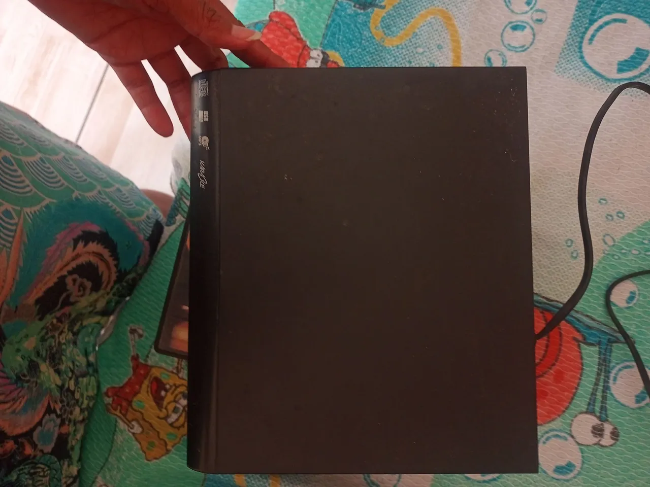 Aparelho de DVD com diversos filmes