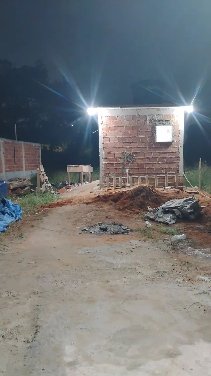 Vendo terreno com quitinete em Xerém.
