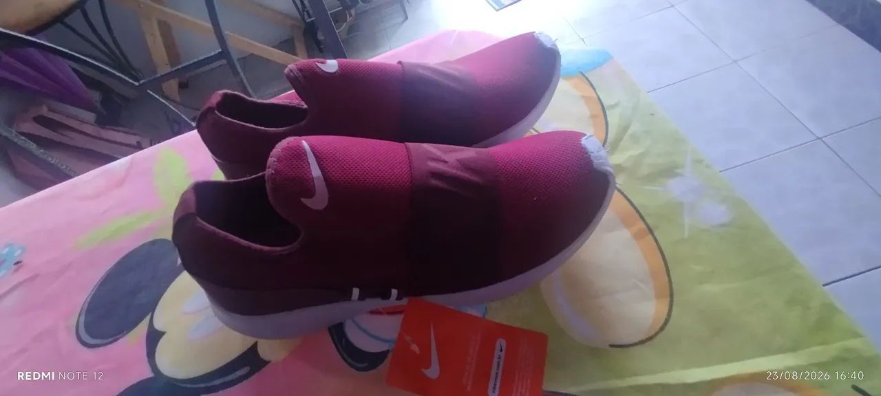 Tênis vermelho marca Nike  - Foto 4