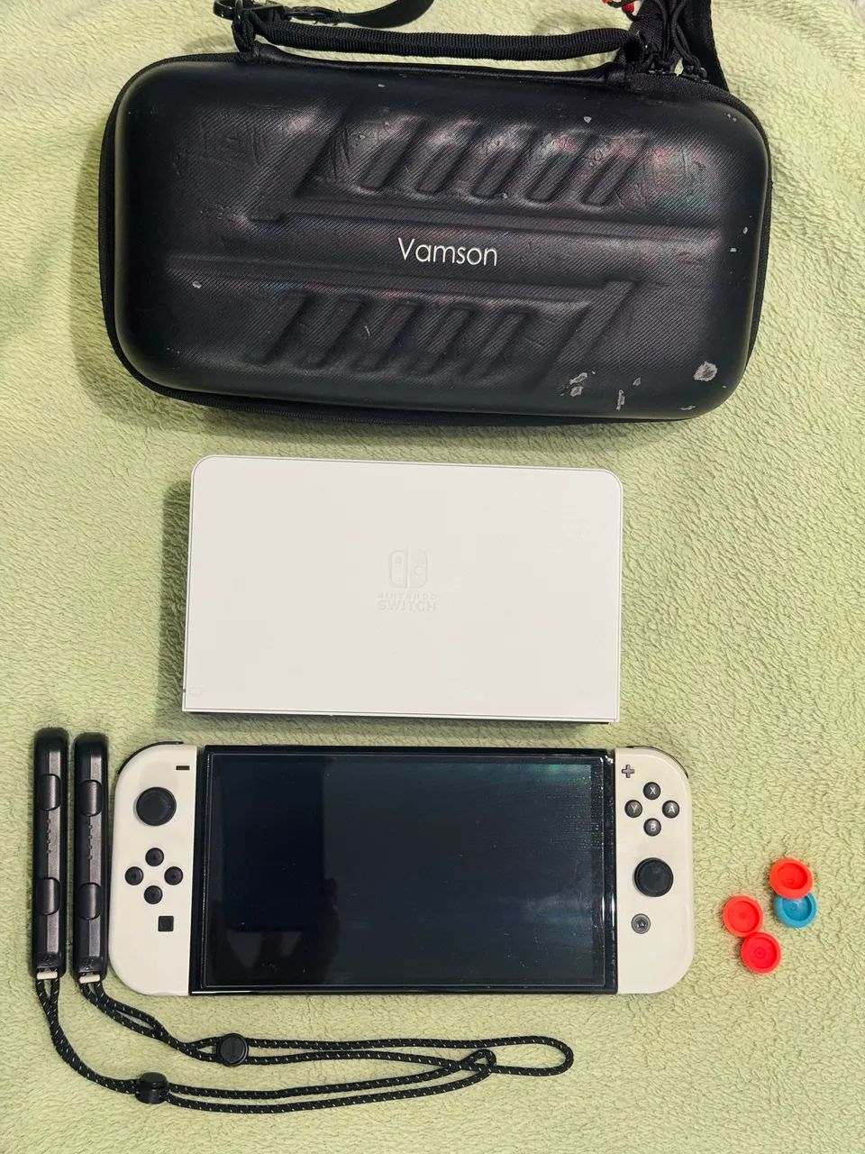 Nintendo switch OLED + película + protetores analógicos