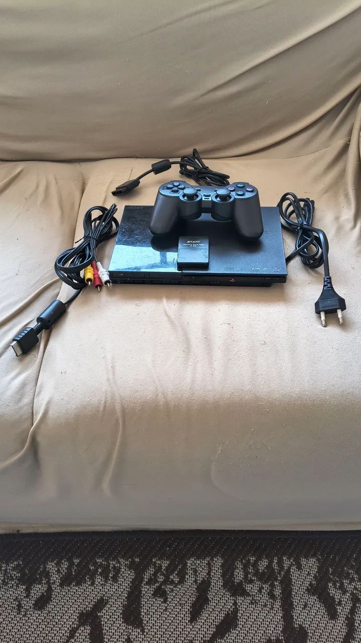 PlayStation 2 Slim funcionando. 