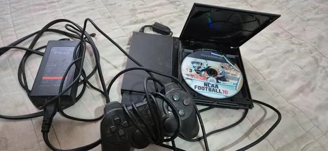 PS 2 slim com 2 controle, 1 memory card e 25 jogos