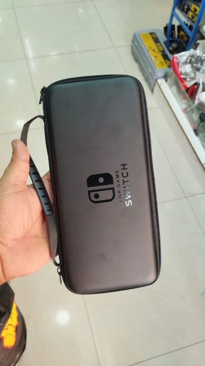 Case transporte switch oled v1 V2 com compartimento cartuchos