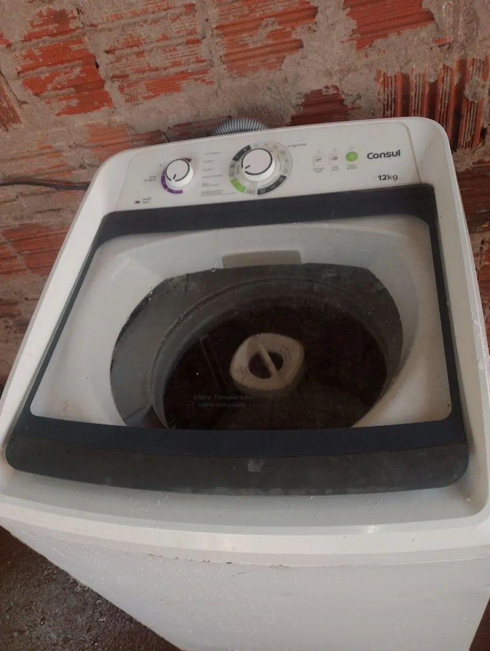 Máquina de lavar com defeito