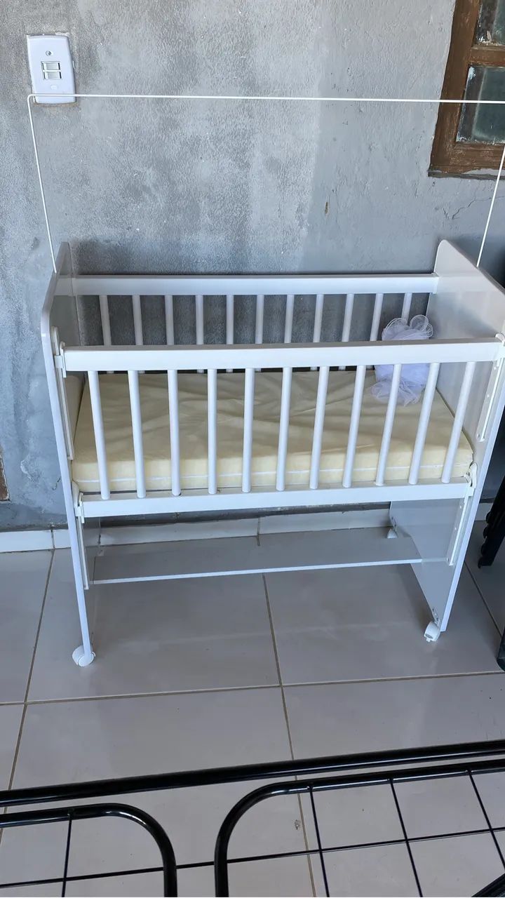 Berço semi novo 