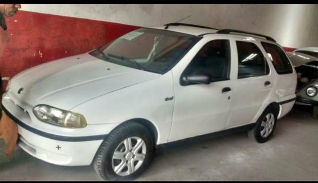 Vendo um carro palio weekend completo Esta emplacado o carro esta bem conservado