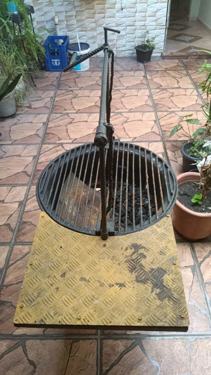 CHURRASQUEIRA DE ARO DE CARRETA 