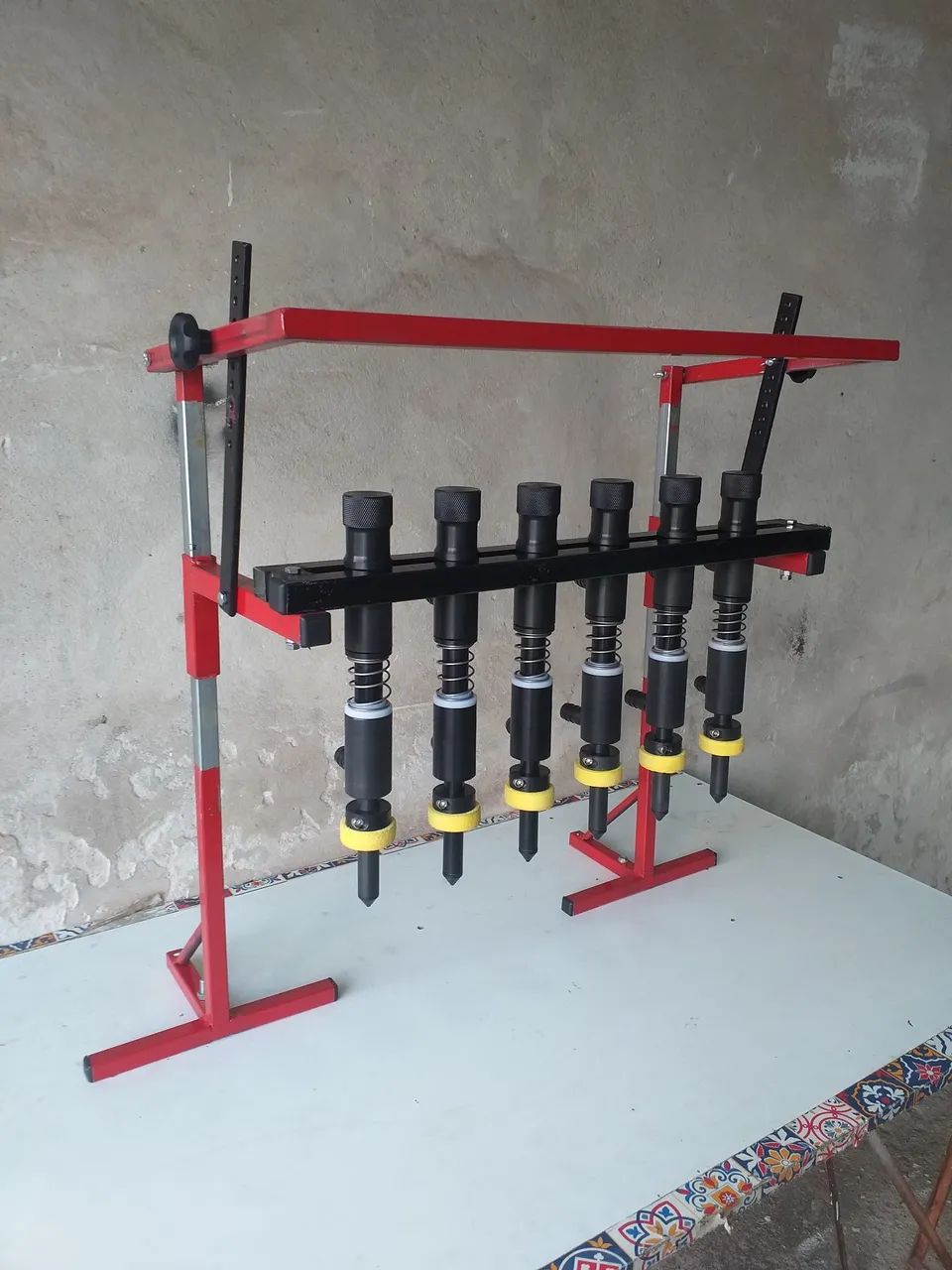 Suporte para bicos de envase 