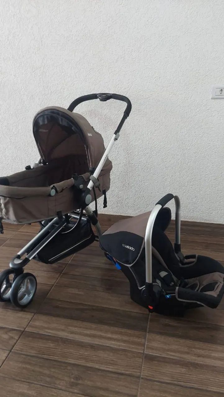 Carrinho Kiddo+ bebê conforto 