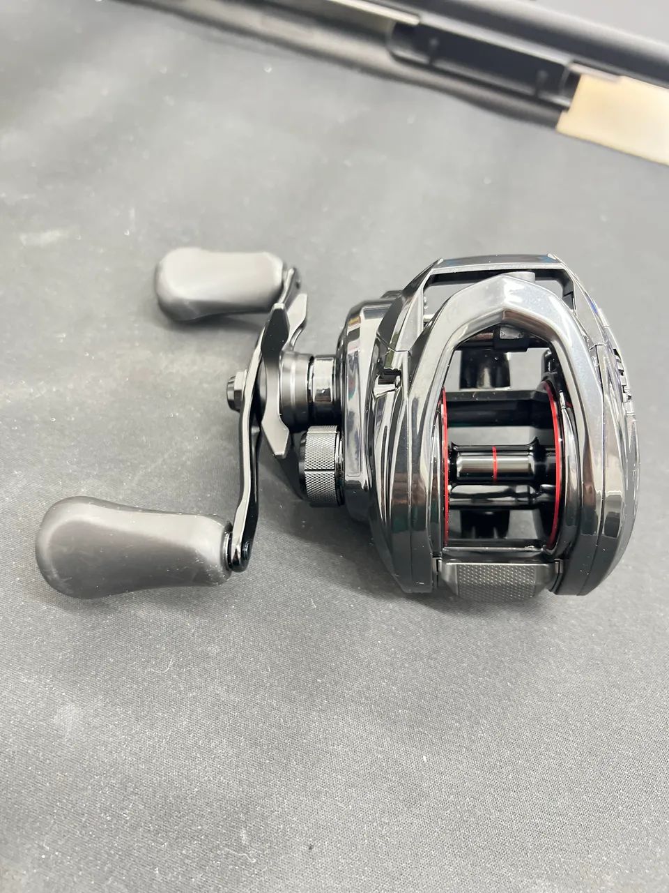 Carretilha DAIWA PT300 HL - Foto 5
