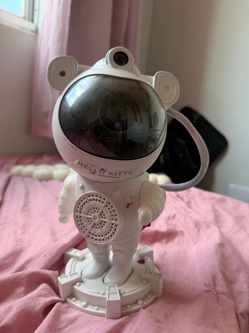 projetor de galáxia e caixa de som Bluetooth em formato de astronauta