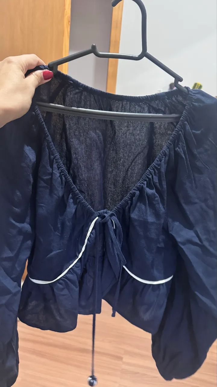 Blusa aberta manga longa