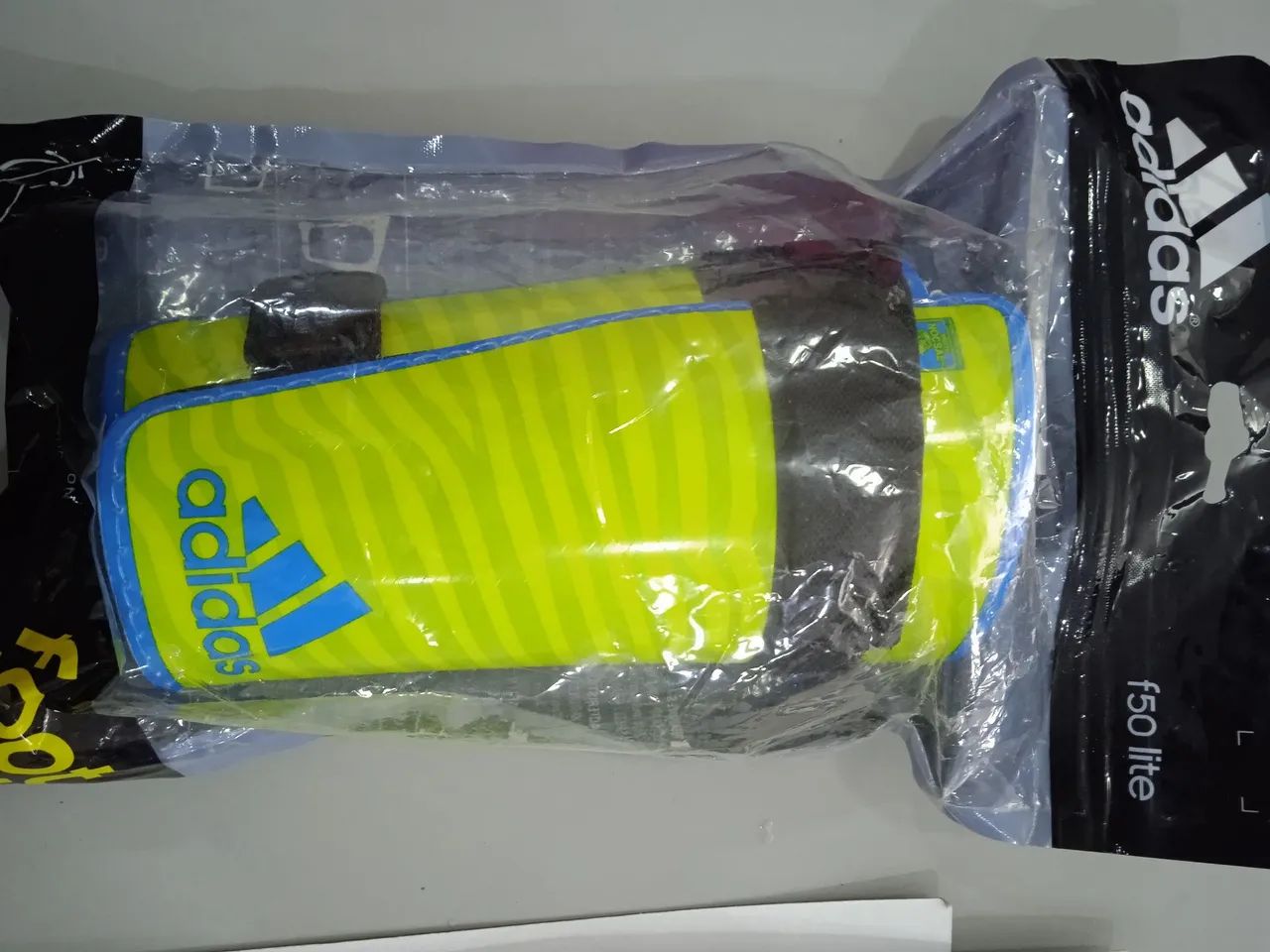 Caneleiras Adidas F50 Lite - Foto 6