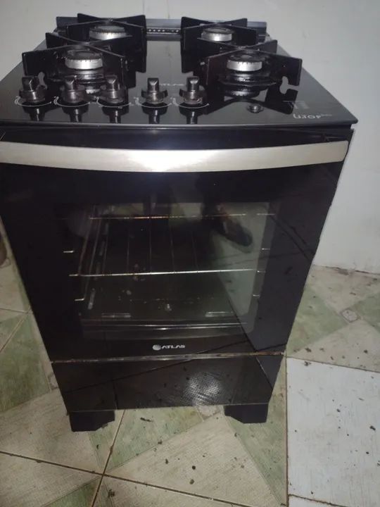 Fogão atlas 4 bocas todo de vidro até a frontal e vidro praticamente novo pra hj