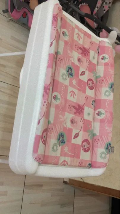 Trocador e suporte de banheira