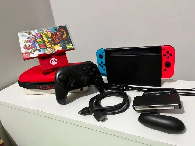  Nintendo Switch V1 completo + Pro Controller + Mario 3D World + Acessórios  - Foto 4