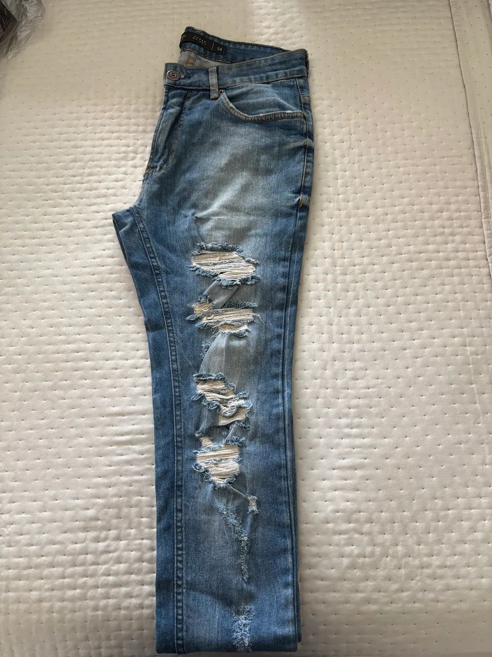 Calça jeans tam 38