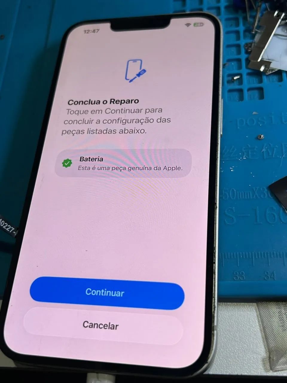 Troca de bateria original de iPhone 13