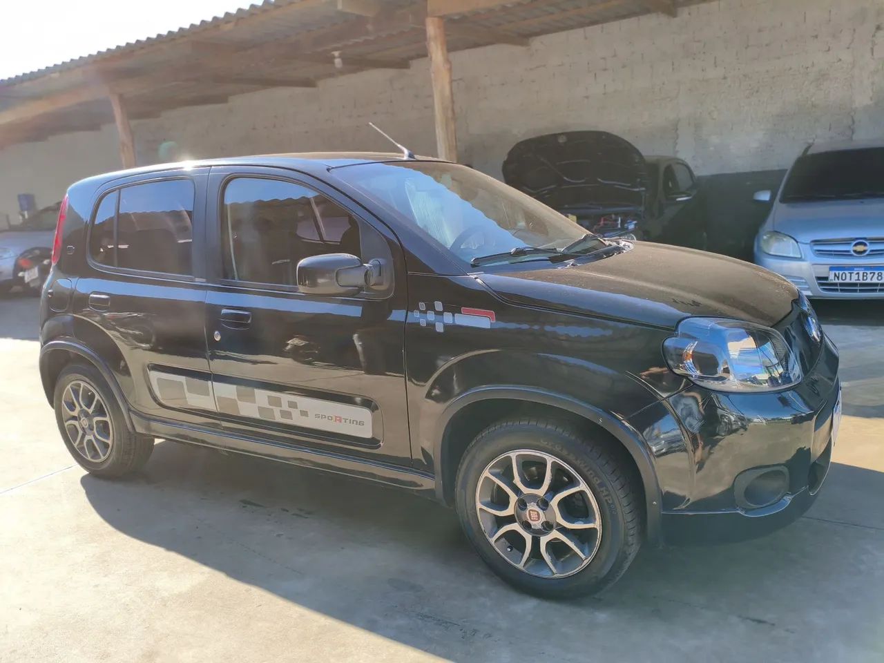 Fiat Uno Sporting 1.4 EVO Fire Flex 8V 4P 2012 - Foto 5