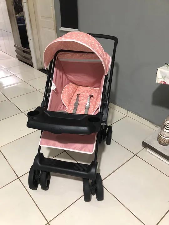 Carrinho de bebê reversível 